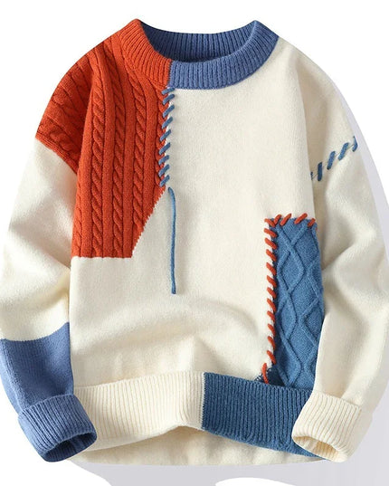 Color-blocked sweater with orange, blue, and white sections on a white background