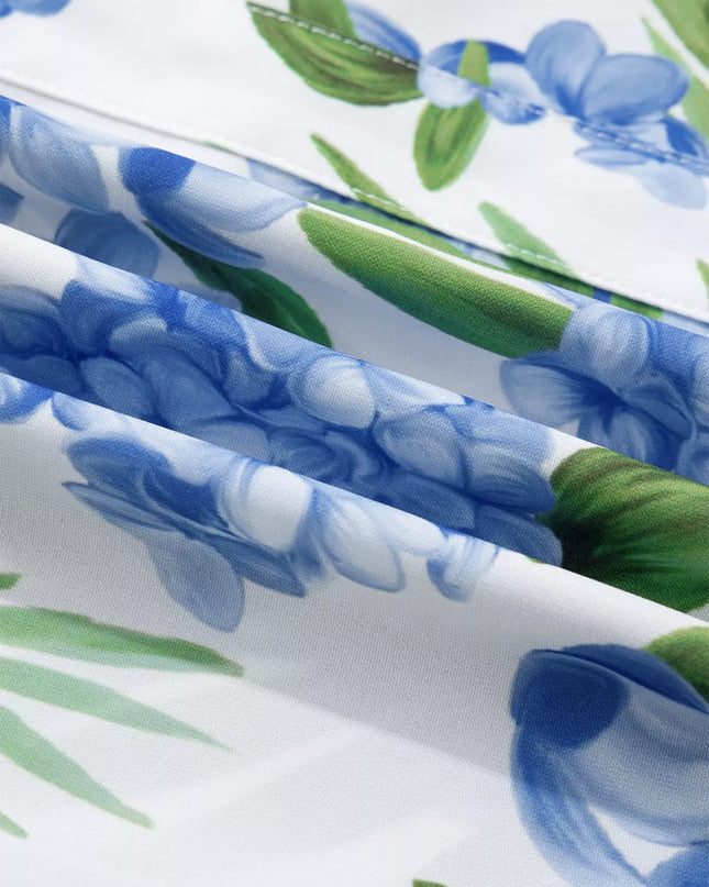 Close-up of blue floral pattern on a white background