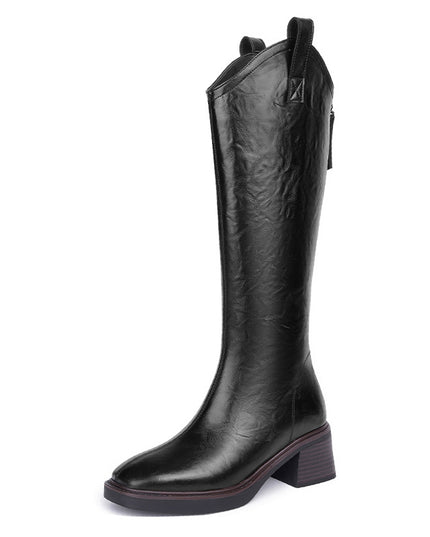 Black knee-high boot on a white background