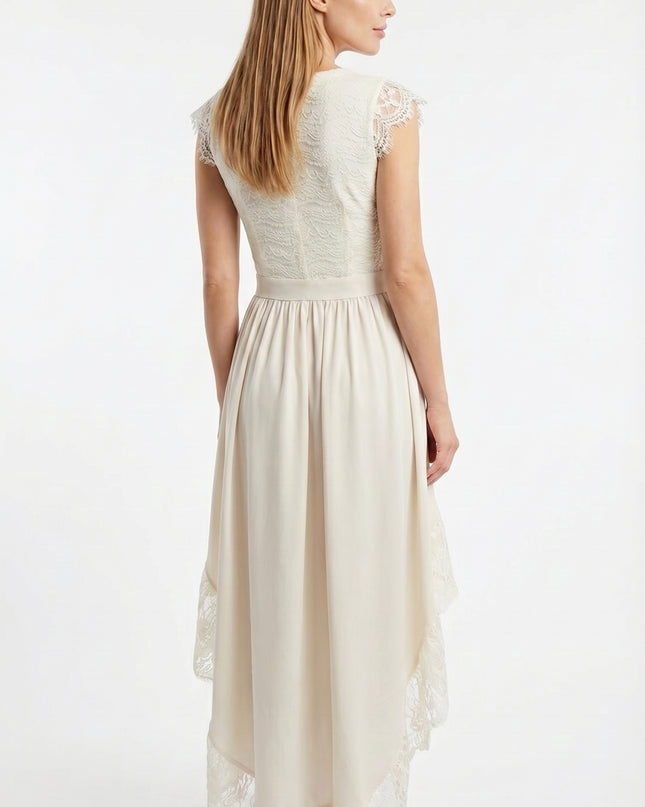 Woman wearing a white lace dress on a white background