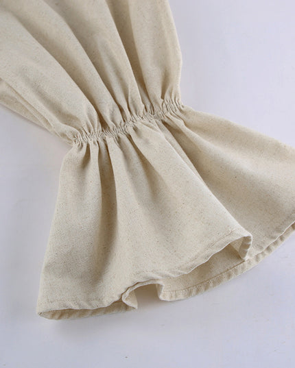 Beige fabric with a gathered waist on a white background