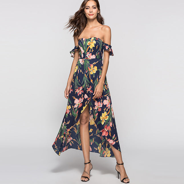 Woman wearing a floral strapless dress on a plain background