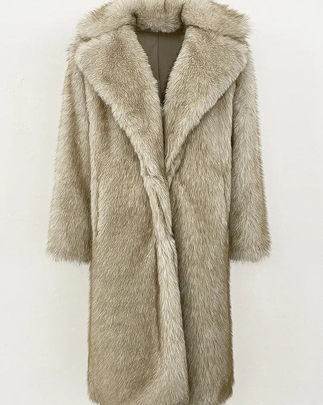Beige fur coat on a white background