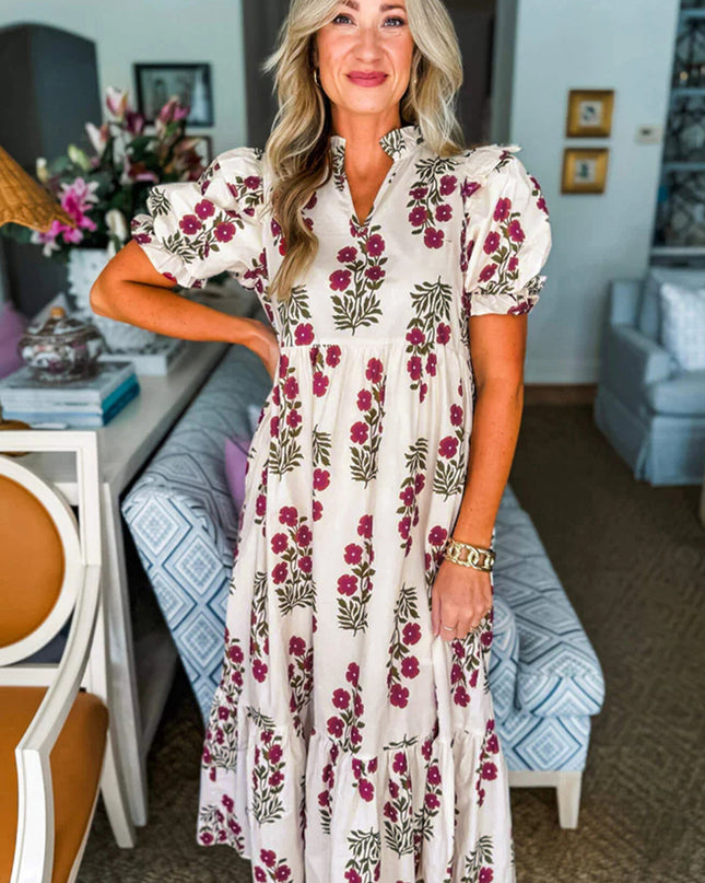 Woman wearing a floral dress in a home setting