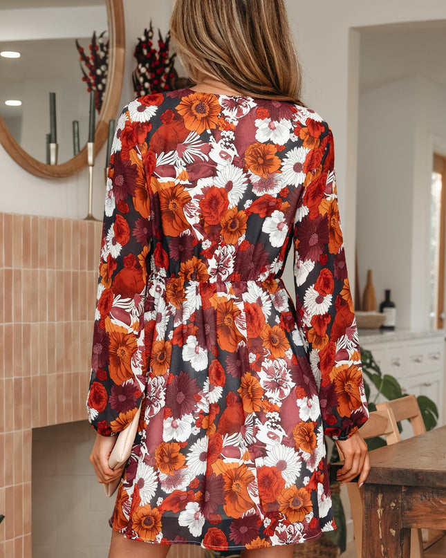 Woman wearing a floral dress in a home setting