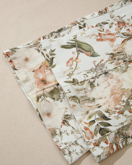 Floral patterned cushions on a beige background