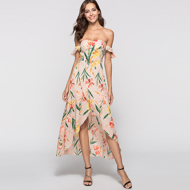 Woman wearing a floral dress on a plain background