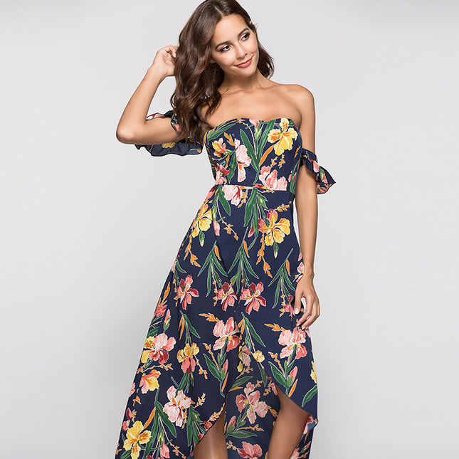 Woman wearing a strapless floral dress on a plain background