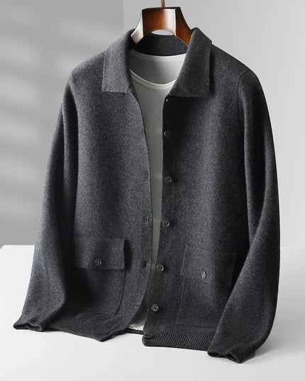 Dark gray cardigan on a mannequin against a light gray background