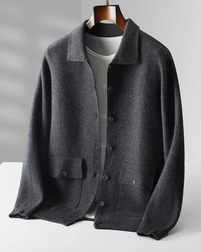 Dark gray cardigan on a mannequin against a light gray background