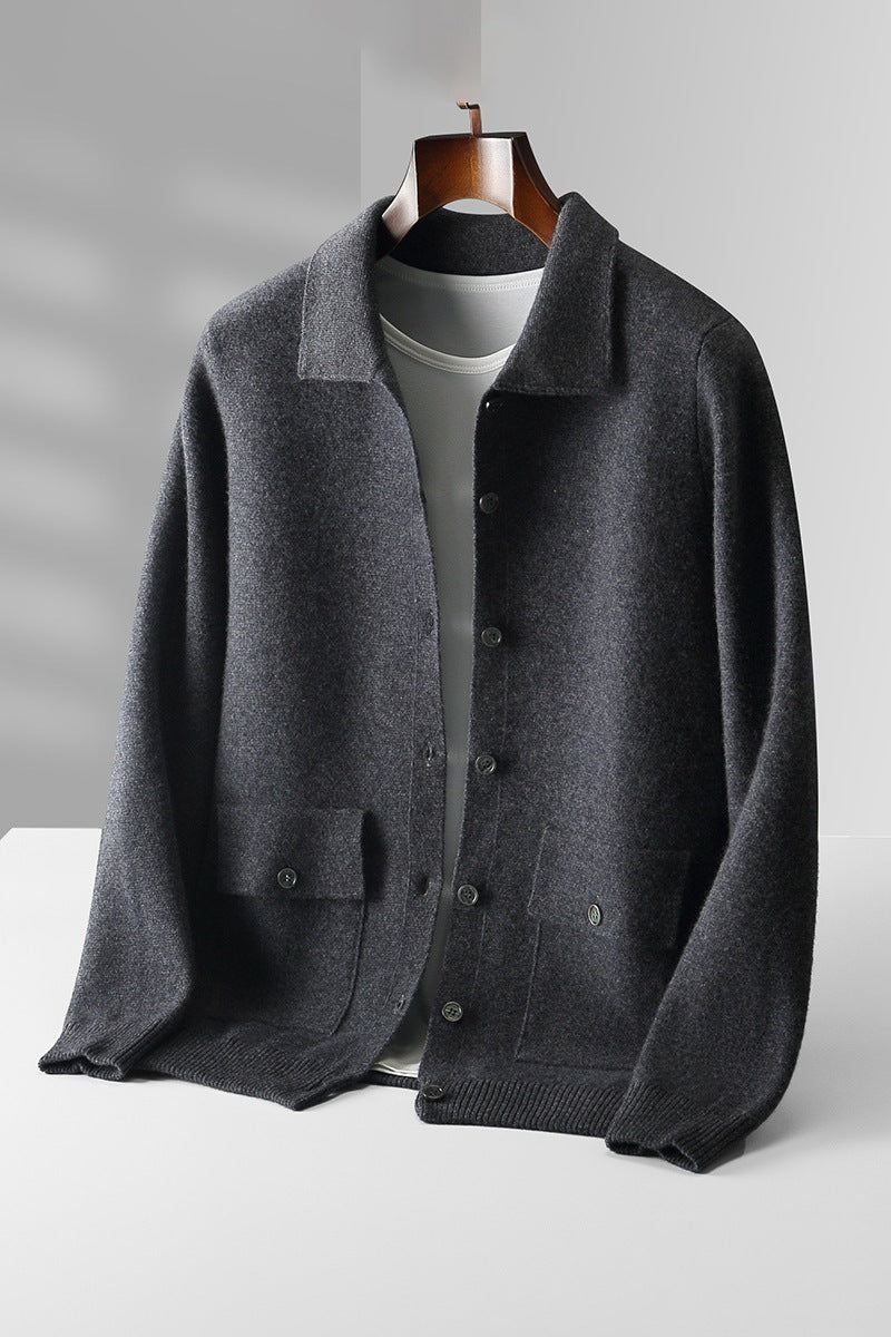 Dark gray cardigan on a mannequin against a light gray background