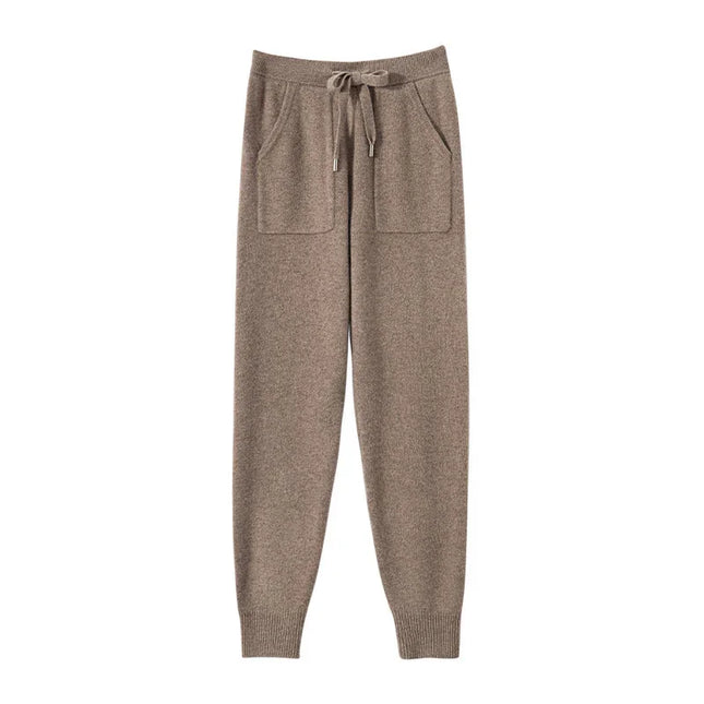 Brown sweatpants with a drawstring on a white background