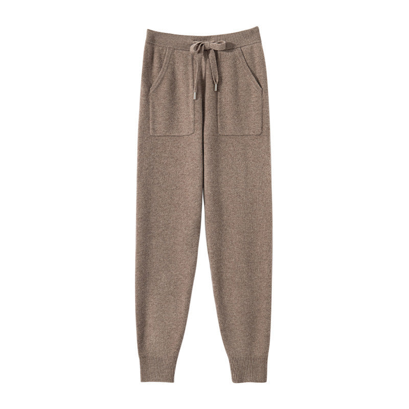 Brown sweatpants with a drawstring on a white background