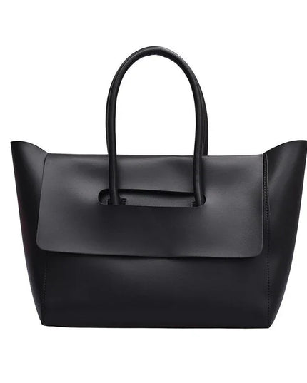 Black handbag on a white background