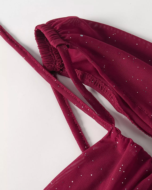 Red bikini top with thin straps on a light gray background