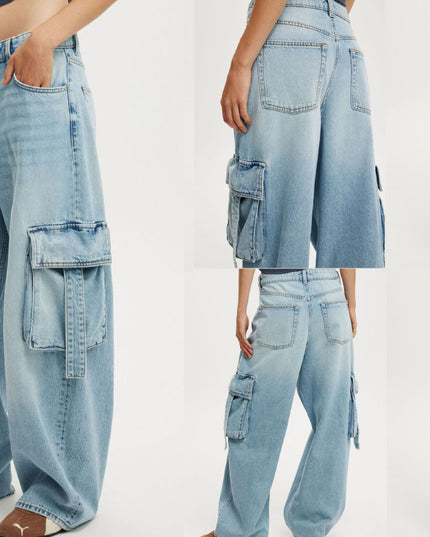 Light blue cargo jeans worn by a person on a white background