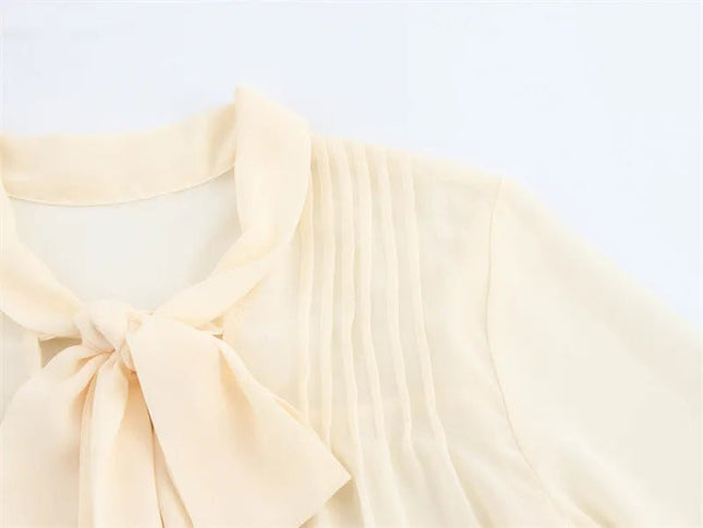 Apricot V-Neck Bow Tie Long Sleeve Top.