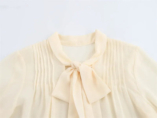 Apricot V-Neck Bow Tie Long Sleeve Top.