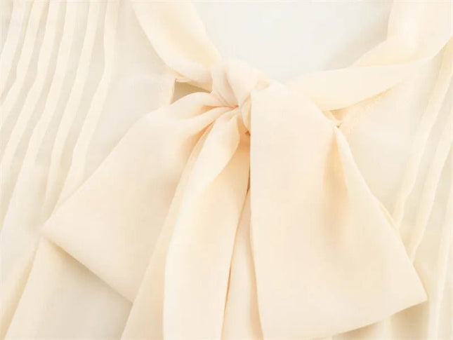 Apricot V-Neck Bow Tie Long Sleeve Top.