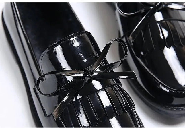 Black Patent Leather Slip On Loafers.