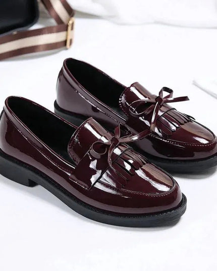 Black Patent Leather Slip On Loafers.