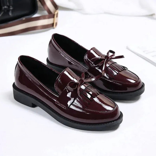 Black Patent Leather Slip On Loafers.