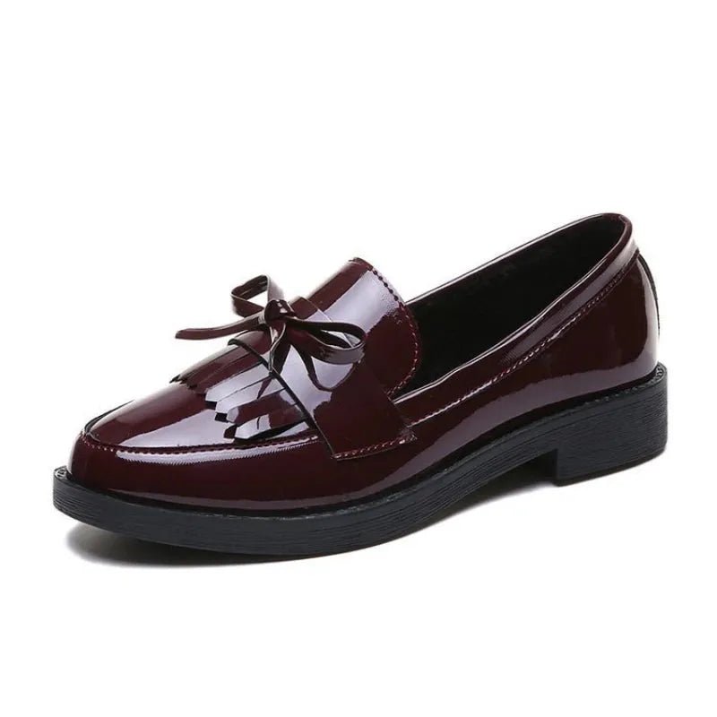 Black Patent Leather Slip On Loafers.