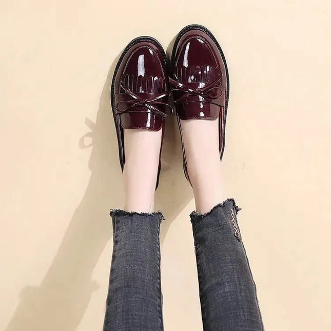 Black Patent Leather Slip On Loafers.