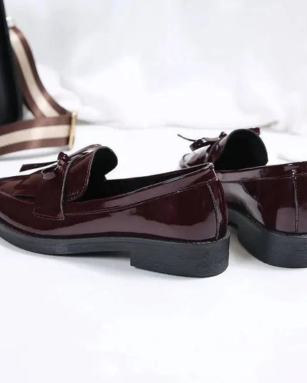 Black Patent Leather Slip On Loafers.