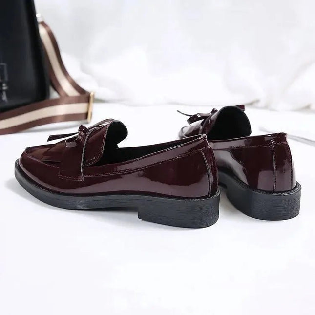 Black Patent Leather Slip On Loafers.