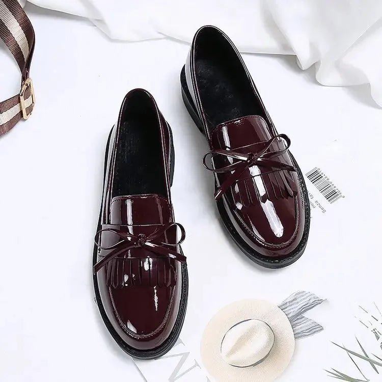 Black Patent Leather Slip On Loafers.