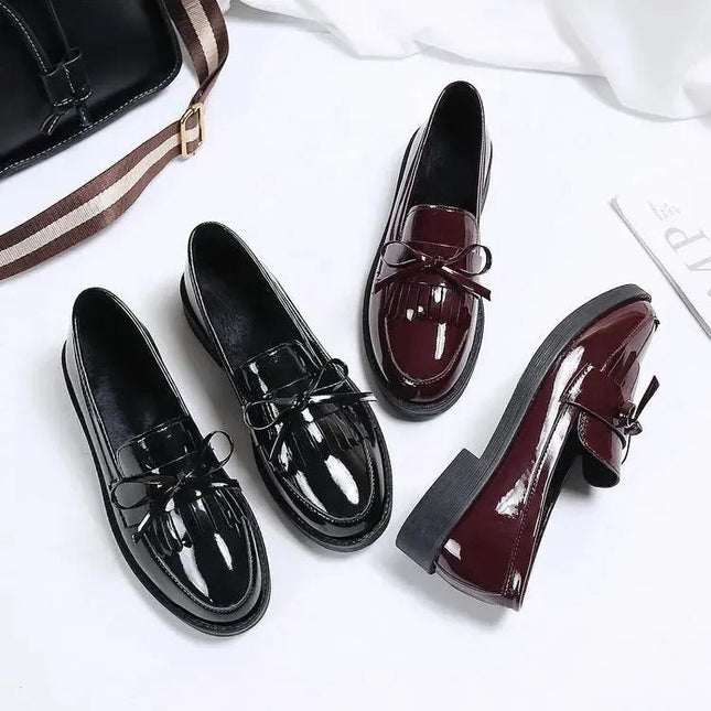 Black Patent Leather Slip On Loafers.