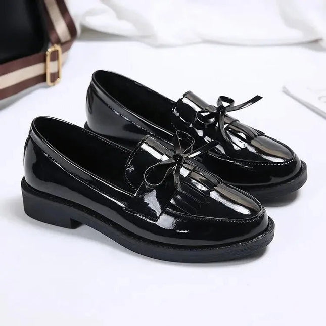 Black Patent Leather Slip On Loafers.