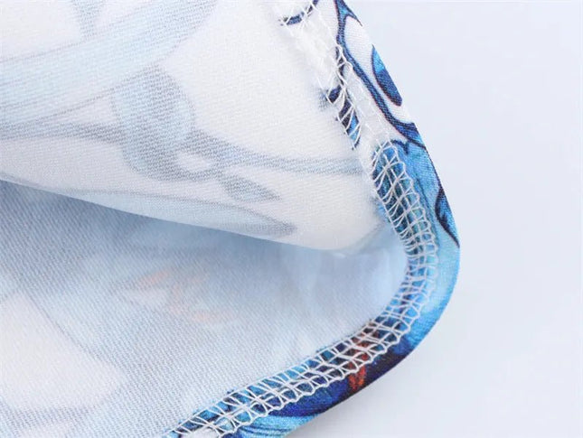 Bold Print Halter Dress – Chic & Flirty Style.