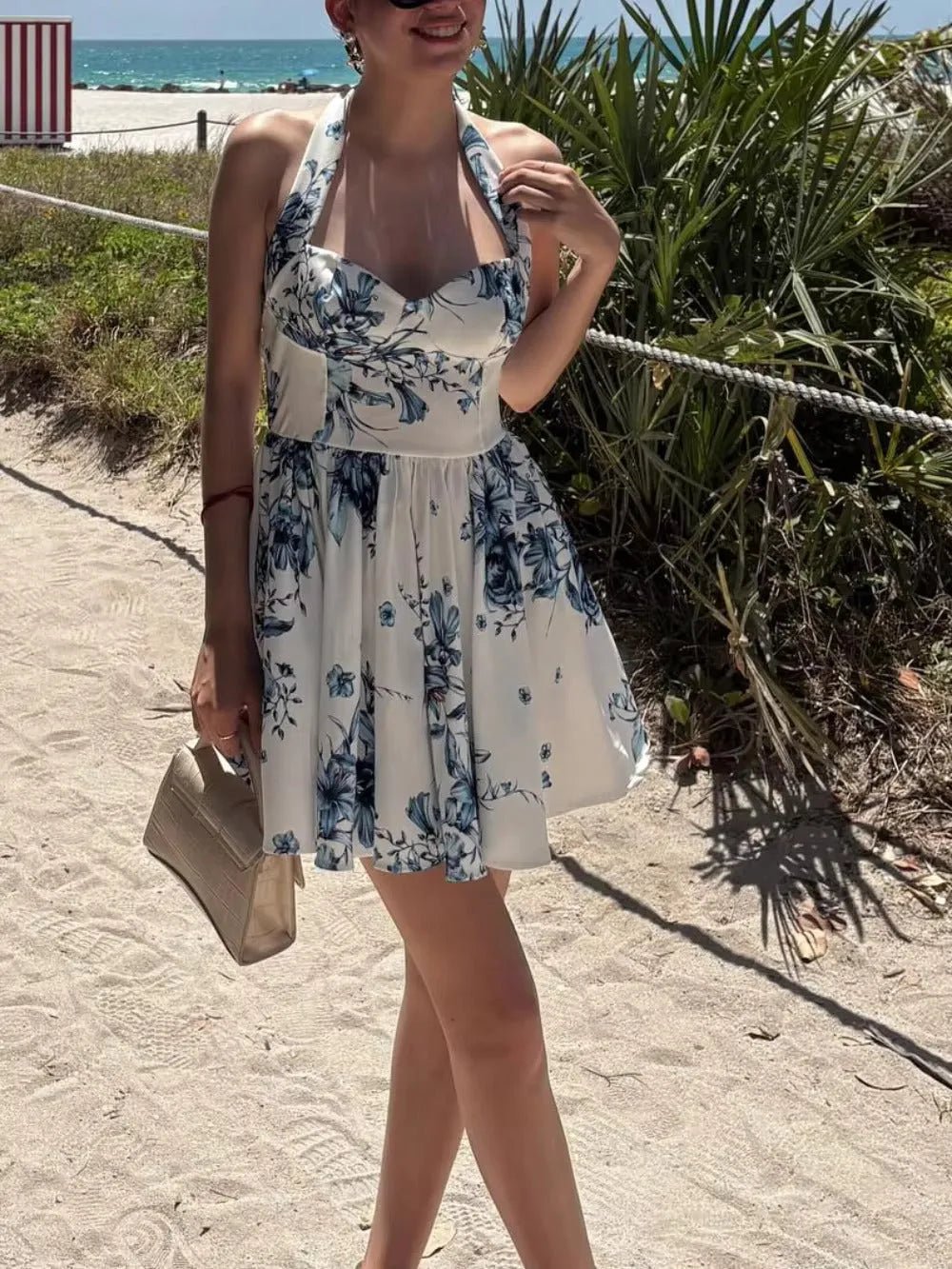 Bold Print Halter Dress – Chic & Flirty Style.