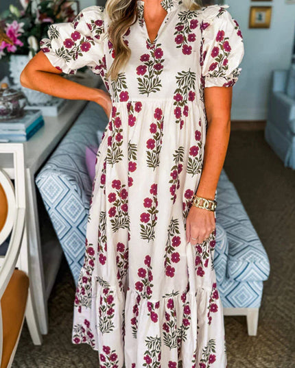 Woman wearing a floral dress in a home setting