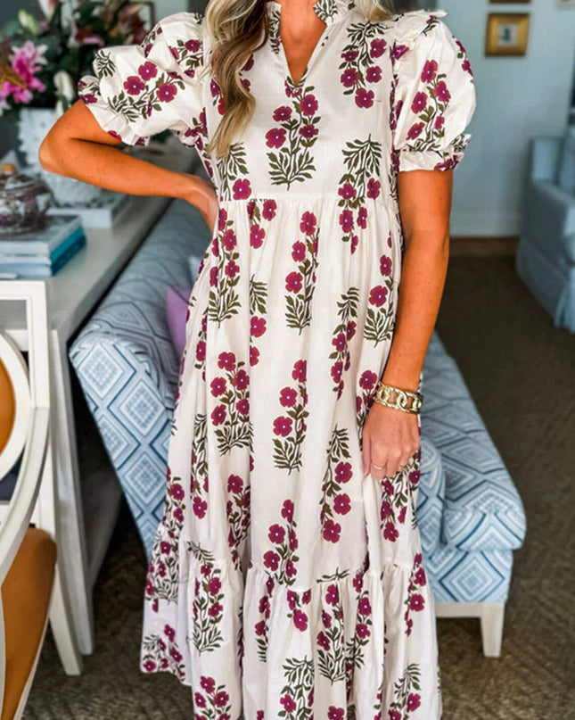 Woman wearing a floral dress in a home setting