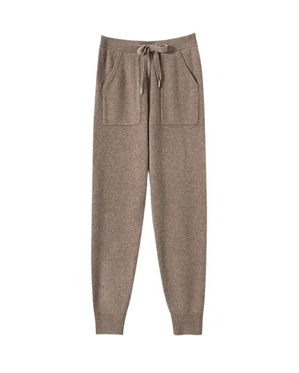 Brown jogger pants with a drawstring on a white background