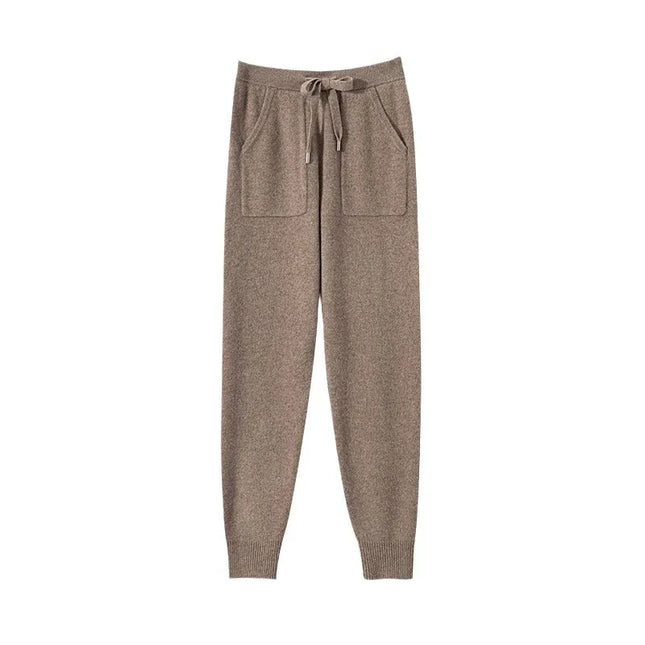 Brown jogger pants with a drawstring on a white background