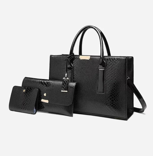 Set of black handbags with a textured pattern on a white background