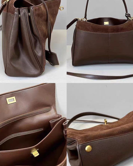 Brown leather handbag with gold accents on a light gray background