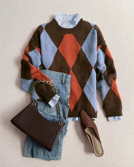 Colorful argyle sweater with jeans and brown shoes on a beige background