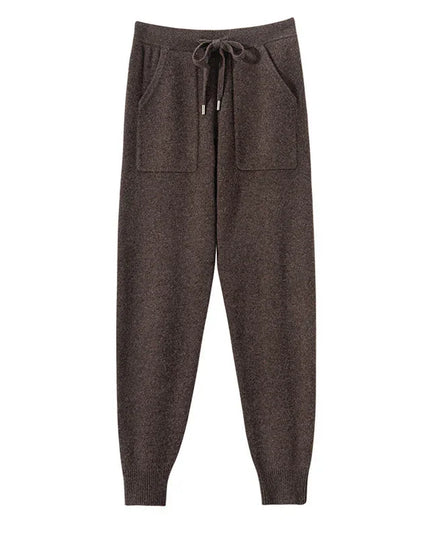 Brown jogger pants with a drawstring on a white background