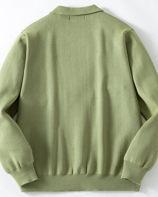 Green sweater on a white background
