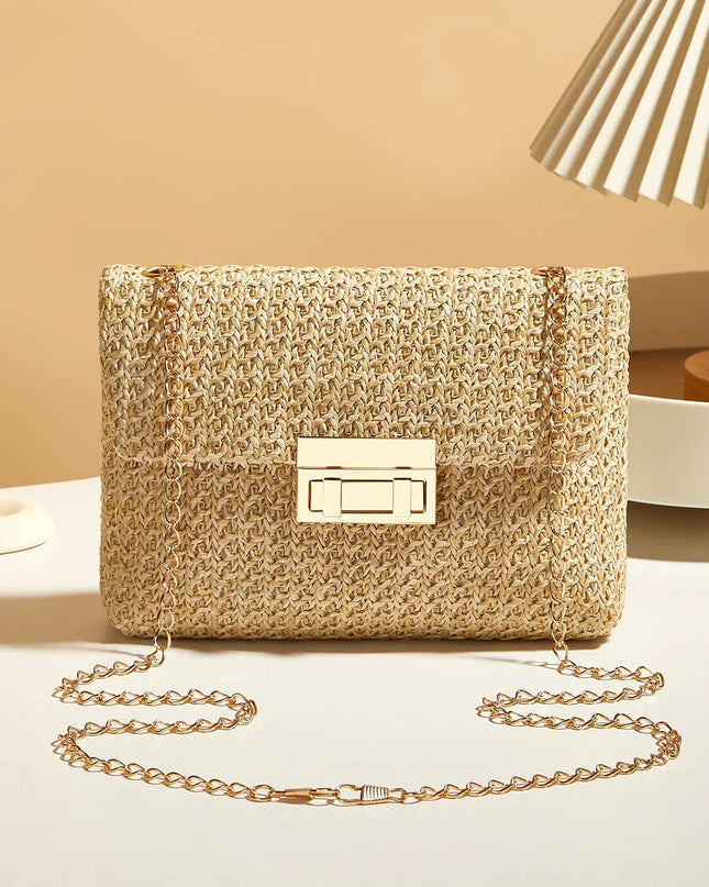 Woven handbag with a chain strap on a neutral background