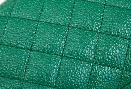 Close-up of a green textured surface with a grid pattern