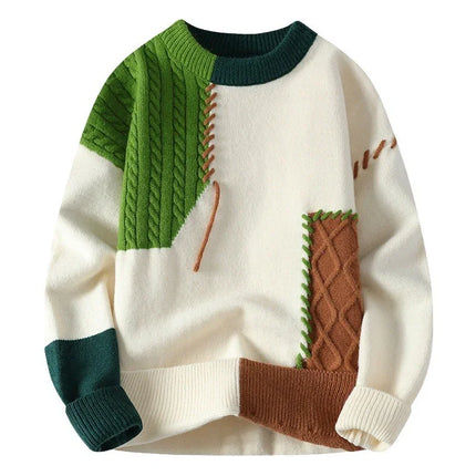 Colorful sweater with green, brown, and white pattern on a white background