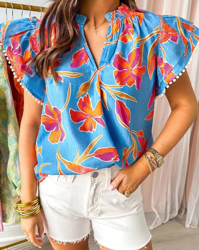 Floral Flutter Sleeve Blouse with Pompom Trim.