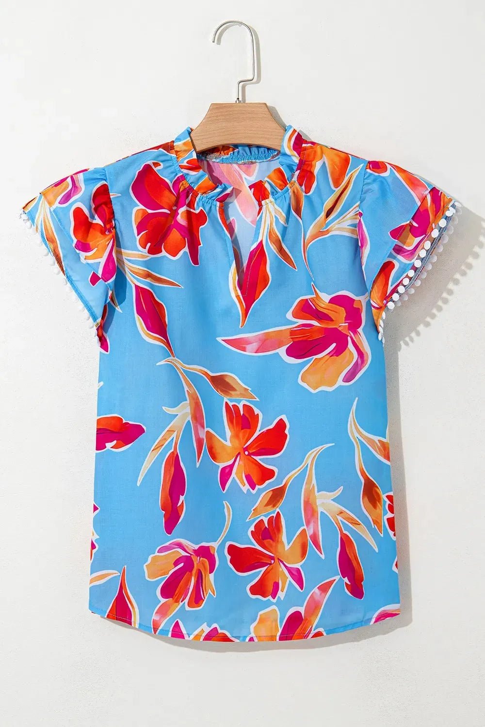 Floral Flutter Sleeve Blouse with Pompom Trim.