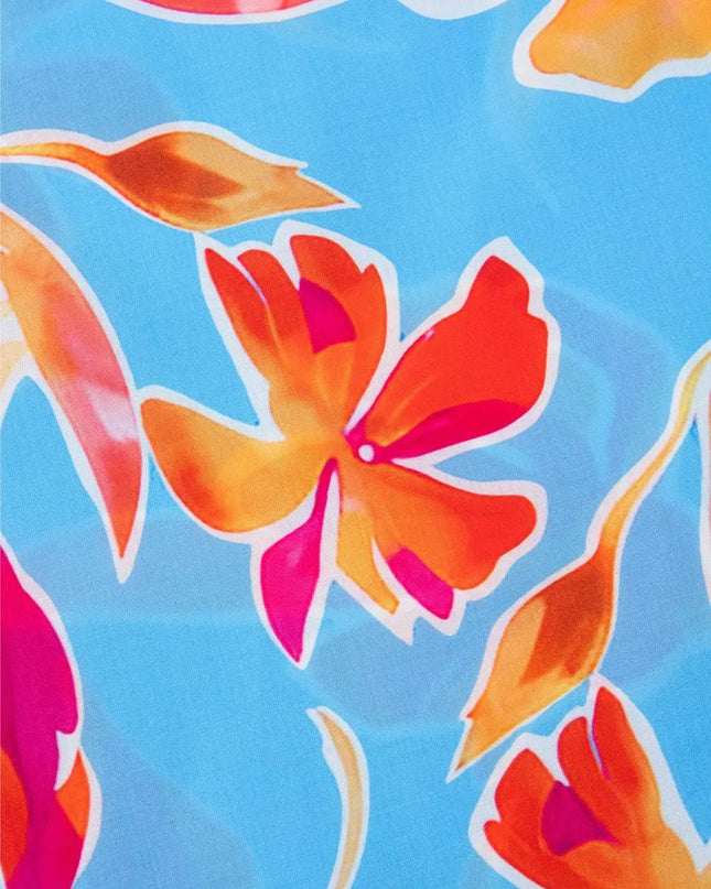 Floral Flutter Sleeve Blouse with Pompom Trim.